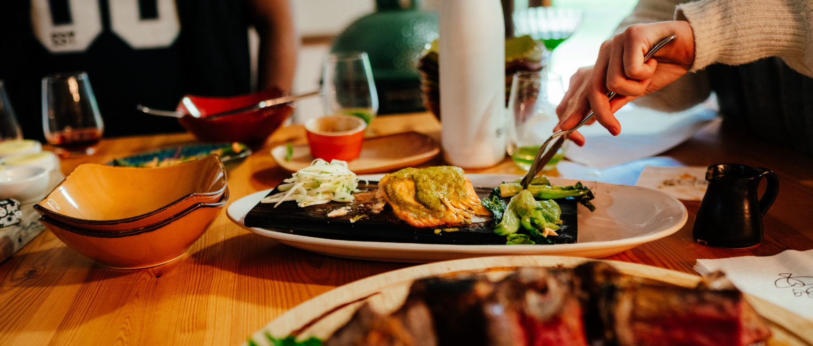 A person cuts food at Lainston House
